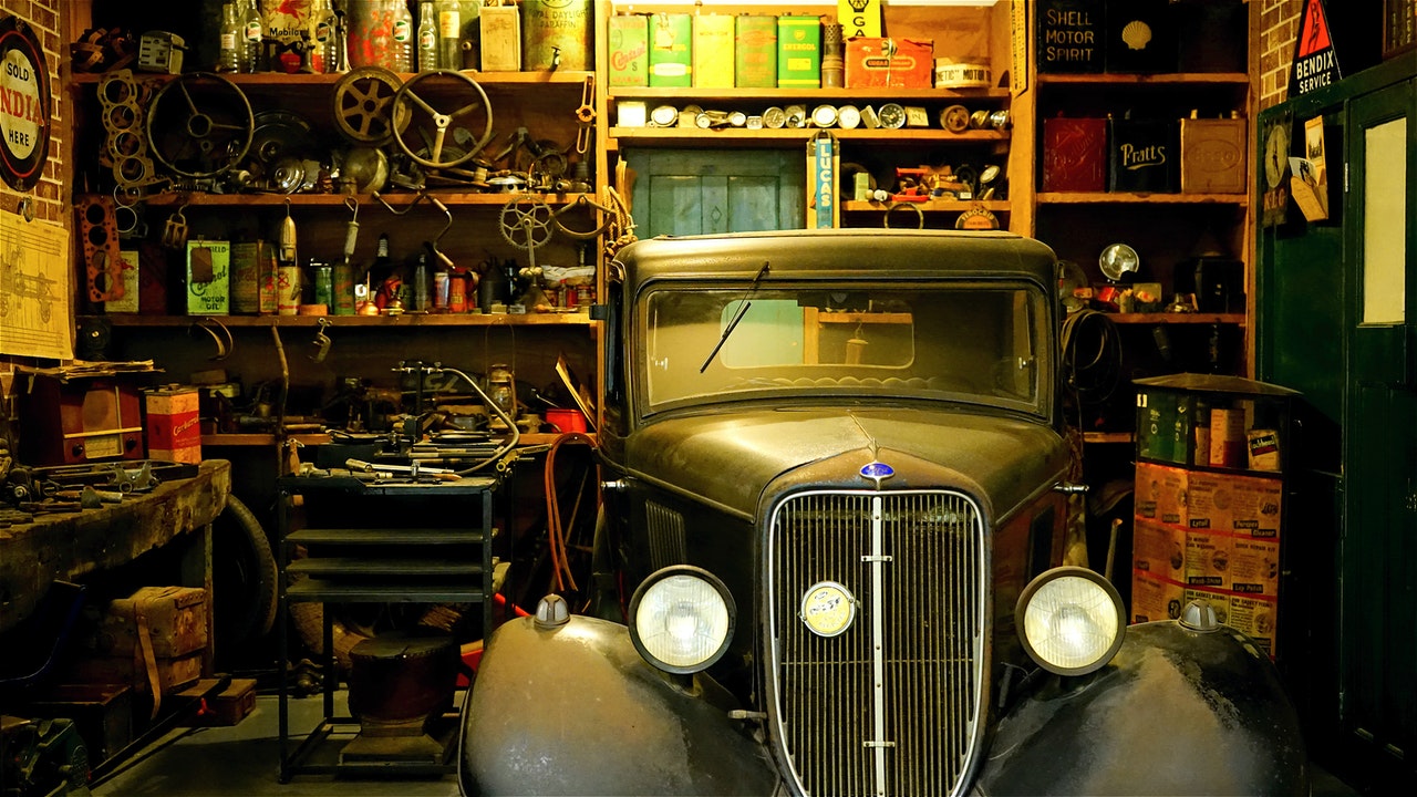 Man cave in a garage with vintage car